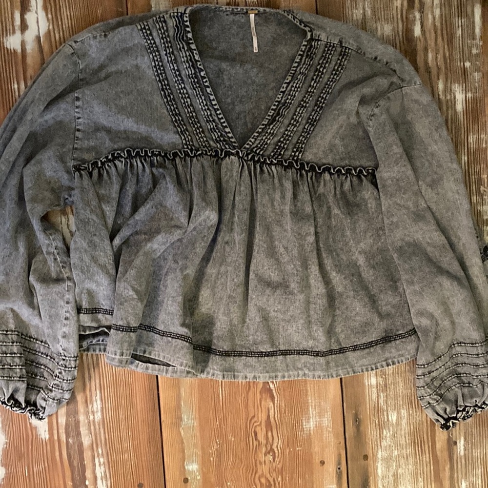 Free people oversized boho faded black denim peasant top.